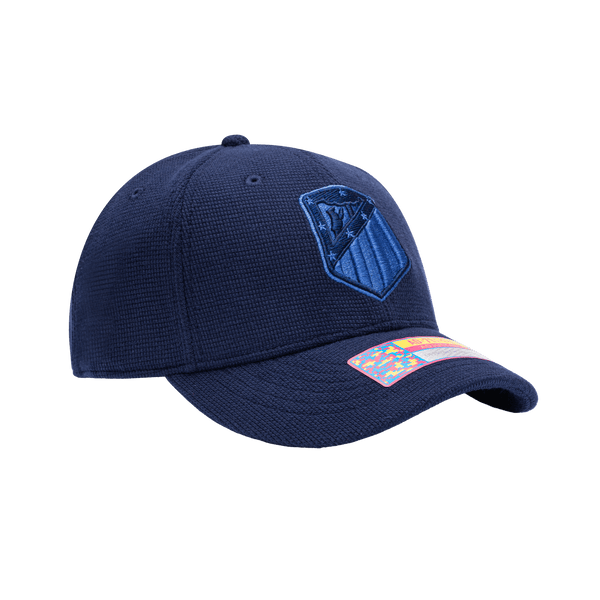 Side view of the Atletico Madrid Club Ink Adjustable with high crown, curved brim, and adjustable strap, in blue.