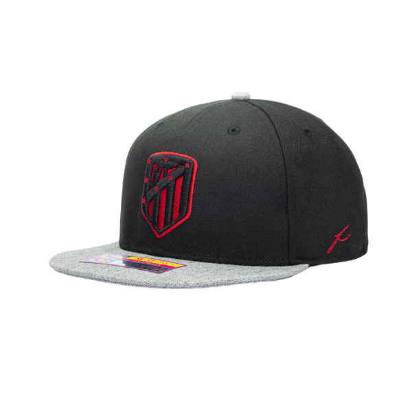 Atletico Madrid snapback in black with fi signature logo on the side and black and red team logo on the front.