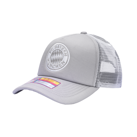 Side view of the Bayern Munich Fog Trucker Hat in Grey/White, with high crown, curved peak, mesh back and snapback closure.