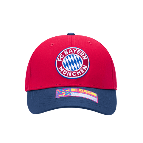 Front view of the Bayern Munich Core Adjustable hat with mid constructured crown, cruved peak brim, and slider buckle closure, in Red/Blue.
