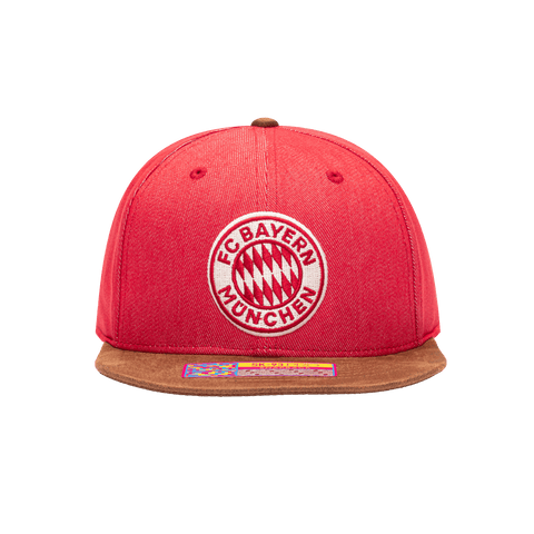 Front view of the Bayern Munich Orion Snapback with high structured crown, flat peak suede-like brim, and snapback closure, in Red/Brown.