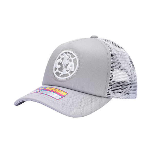 Side view of the Club America Fog Trucker Hat in Grey/White, with high crown, curved peak, mesh back and snapback closure.