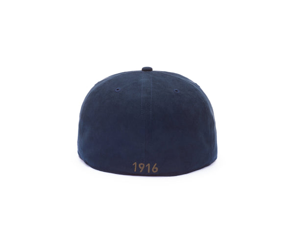 View of back side of Club America Tifoso Fitted with year team was founded embroidered on the back