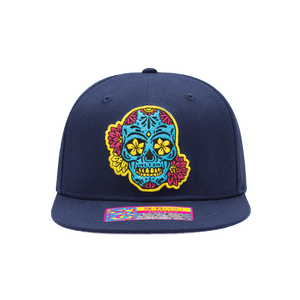 Club America Day of the Dead Snapback Hat with floral skull embroidered on the front, Club America embroidered on the side, "Dia de Muertos" embroidered on the back. The hat has a high crown, flat peak brim, and a snapback closure.