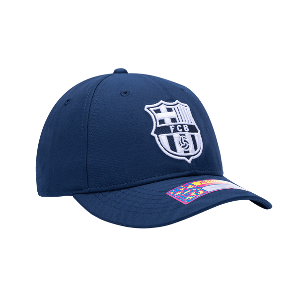 Side view of the FC Barcelona Hit Adjustable hat with mid constructured crown, curved peak brim, and slider buckle closure, in Navy.