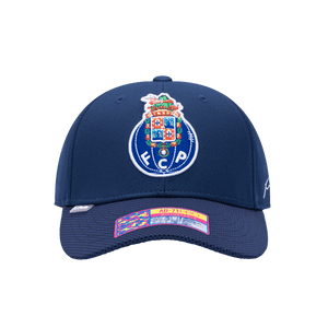 Front view of the FC Porto Trigger Adjustable hat with mid constructured crown, curved peak brim, and slider buckle closure, in Navy.