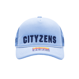 Manchester City Pride Trucker with mid crown, curved peak brim, mesh back, and snapback closure, in Light Blue