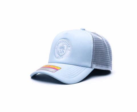 Manchester City Fog Trucker hat with high, constructed crown, curved peak, and snapback closure, in Light Blue