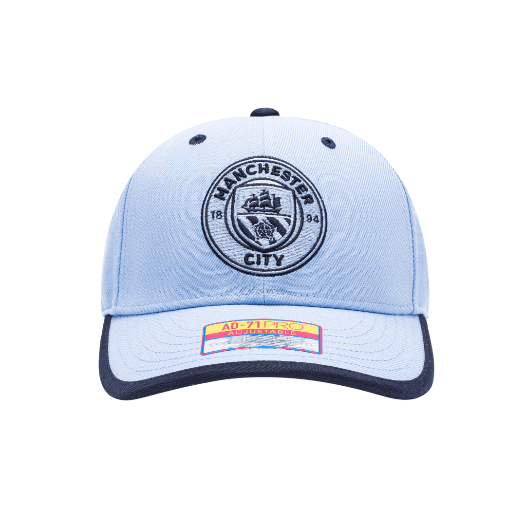 Manchester City Tape Adjustable with high crown, curved peak brim, and adjustable buckle strap closure, in Light Blue