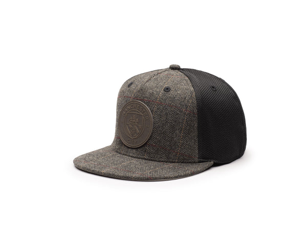 Side view of Manchester City Sherlock Snapback in high structured crown, flat peak brim, adjustable back closure, in Grey/Black