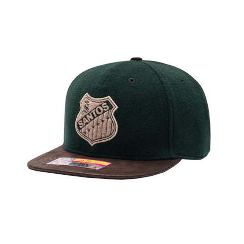 Santos Laguna Prep Snapback Hat with structured high 6-panel crown in melton wool, flat peak PU leather brim, front embroidered wool backed applique patch with merrowed edges, back embroidered club name, in green and brown.